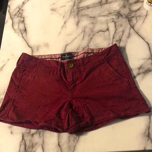 American Eagles Outfitters maroon shorts.